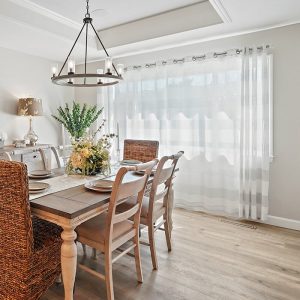Dining room with natural wood table and chairs from a bay area home remodel